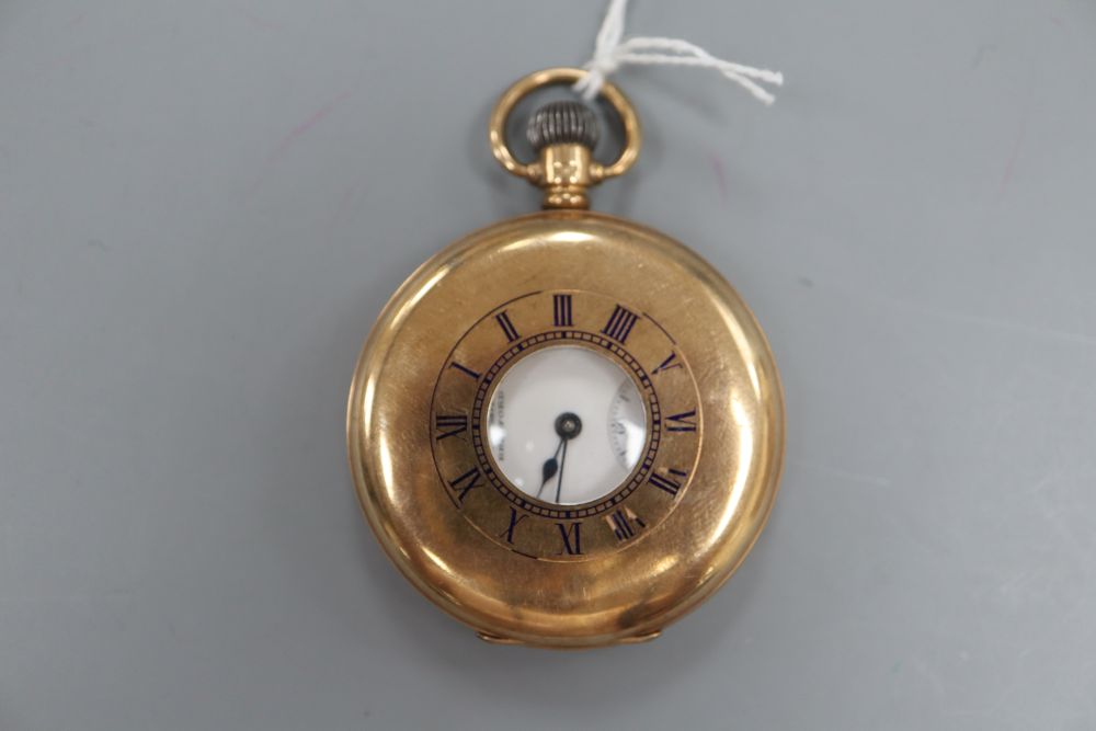 A George V 9ct gold half hunter keyless pocket watch, retailed by Fattorini & Sons, gross 97.7 grams,